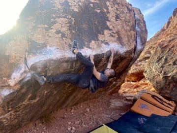 Oswaldo Zuniga puts his climbing goals into action on Alexisizer, V6 at the Kraft Boulders in Red Rocks.